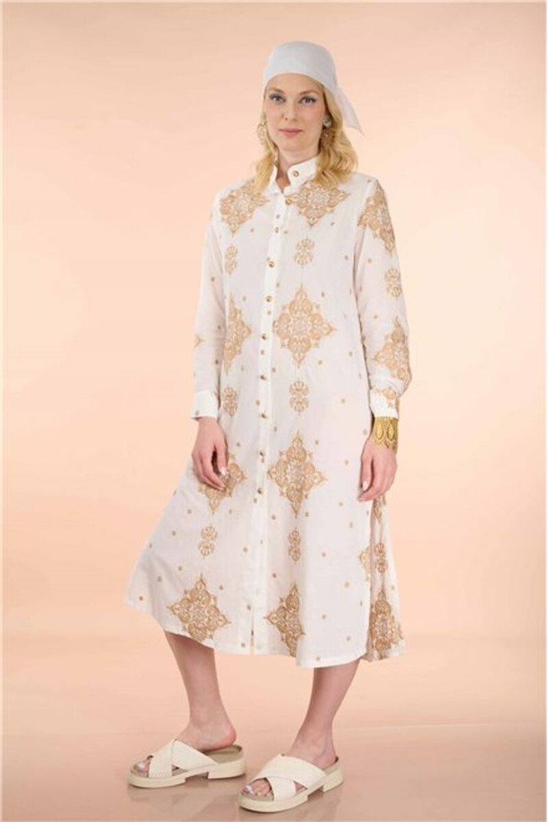 PRINTED SHIRT DRESS WITH COLLAR AND LONG SLEEVES.FRONT FASTENING WITH BUTTONS