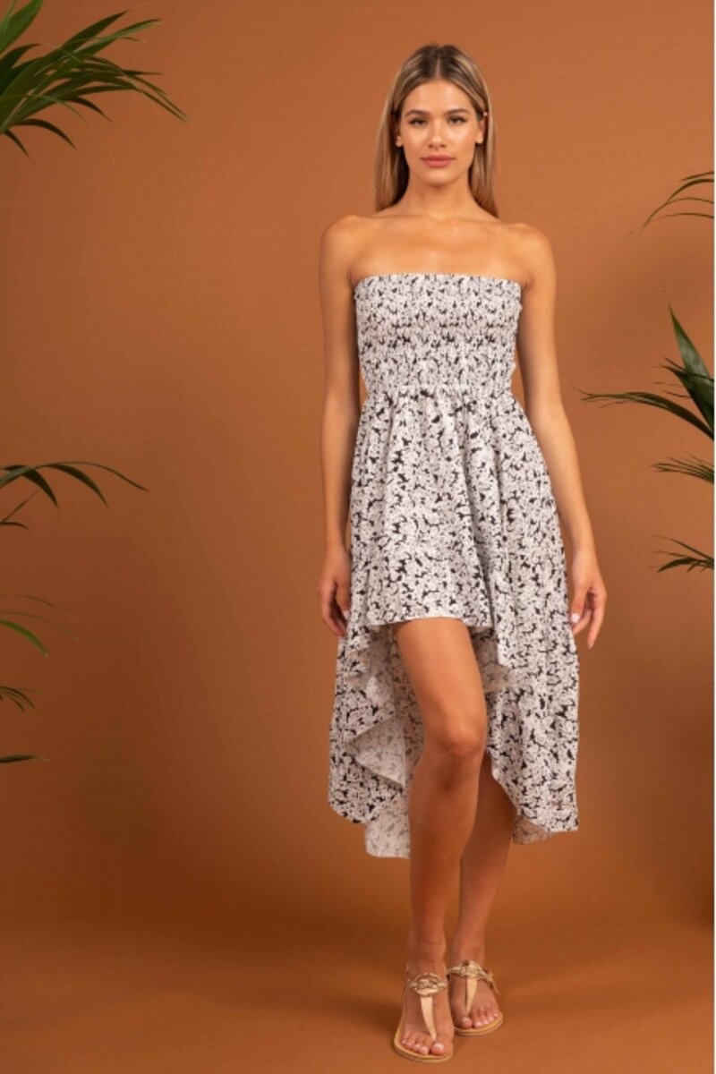 SKIRT-DRESS WITH FLOWER AND SHORT TO THE FRONT WITH FUFFLES