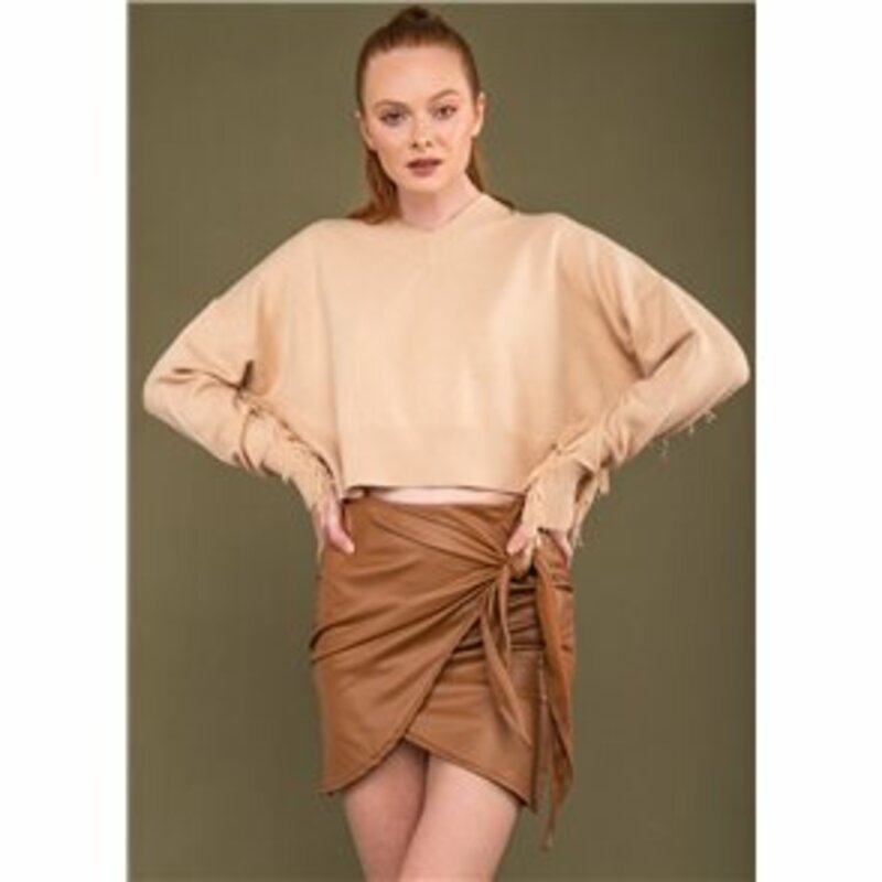 LEATHER SKIRT WITH ASYMMETRIC BOUND